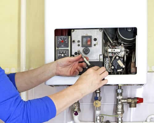 Tankless Water Heater vs Traditional - Out The Door Plumbing